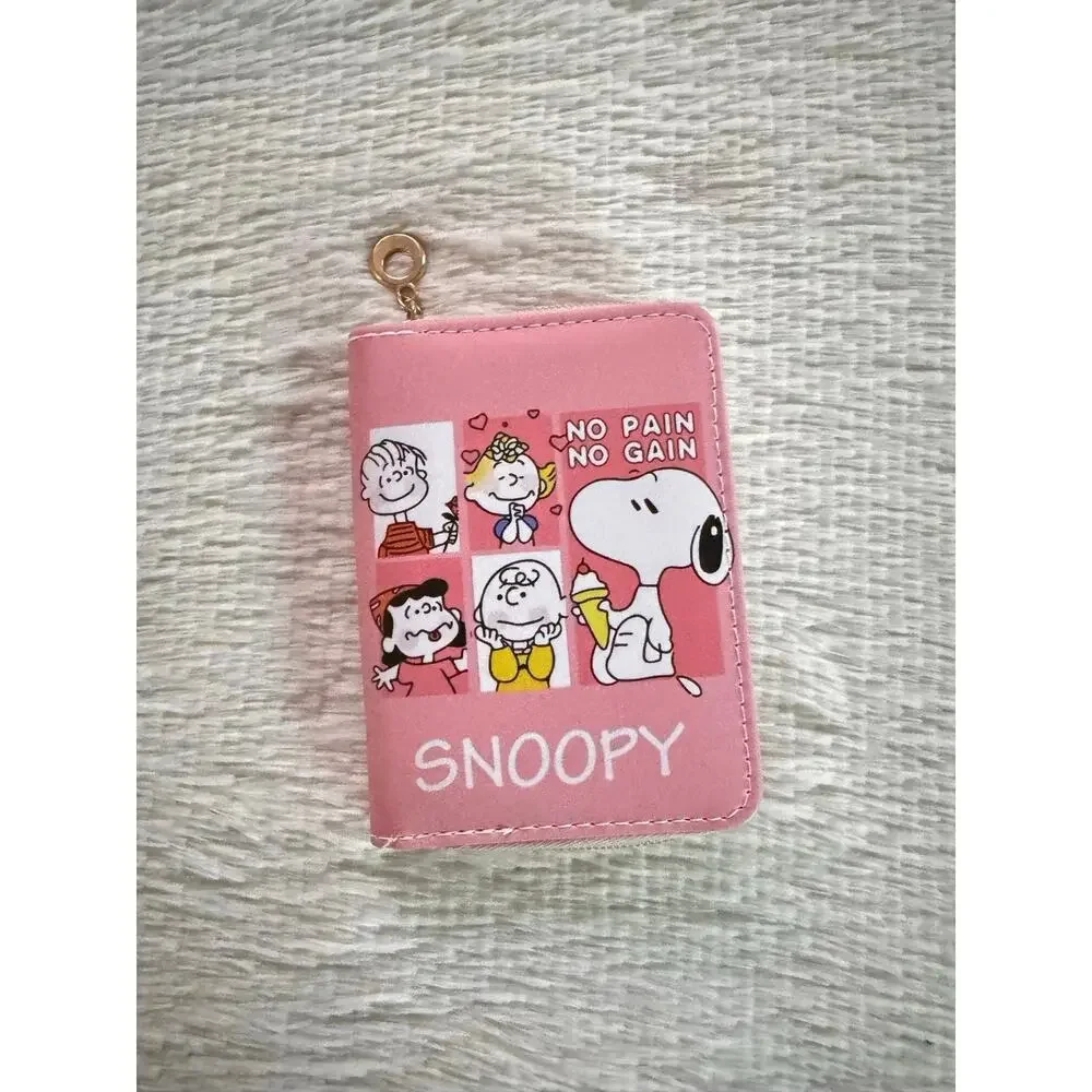 Pink Snoopy wallet with cartoon characters and 'NO PAIN NO GAIN' text